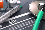 STD - Printed Diagnosis on Grey Background.