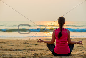 relaxation in the lotus position by the ocean