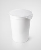 White plastic container for dairy foods with foil lid