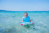Young surfer girl