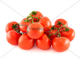 Pile of red tomato bunches over white background