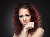 Beautiful  woman with red curly hair