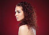 Beautiful  woman with red curly hair
