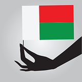 Hand with flag Madagascar