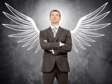 Businessman with angel wings