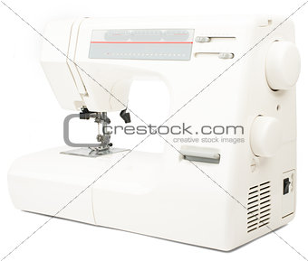 Electric sewing machine on white background