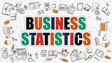 Business Statistics on White Brick Wall.
