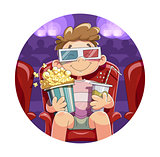 Boy with popcorn and drink in cinema