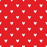 Tile vector pattern with white hearts on red background