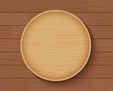 wooden plate on wood table background 