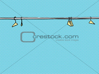 Empty Clothes Hangers on Rod