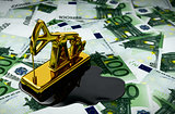 Gold Pumpjack And Spilled Oil On Euros