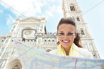 Woman near Cattedrale di Santa Maria del Fiore looking at map