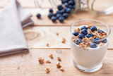 Nutritious and healthy yoghurt with blueberries and cereal