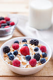 Healthy and nutritious yoghurt with cereal and fresh raw berries