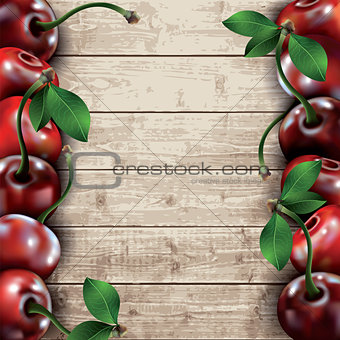 Many cherries on wooden texture background.