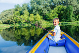 Boy fishing at the river
