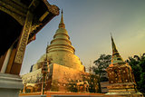 Chapel of Thai temple handmade and Golden Pagoda at Wat Pra Singh, Chaingmai, Thailand