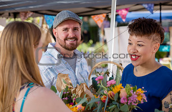 Couple with Flower Seller at Famers Market