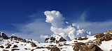 Panoramic view on snowy rocks at nice day