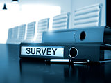 Survey on Office Binder. Blurred Image.