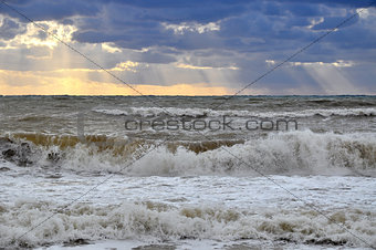 Sea storm in the sunlight