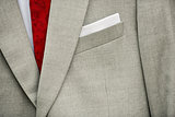 Groom gray suit with red tie