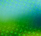 Green blurred halftone vector background