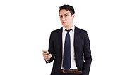 Young Caucasian business man holding a phone
