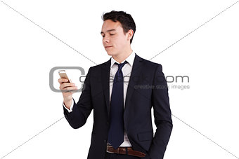 Young Caucasian business man looking at mobile phone