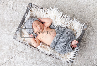 Beautiful newborn inside a basket