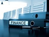 Finance on Office Binder. Blurred Image.
