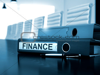 Finance on Office Binder. Blurred Image.