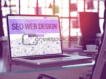 Laptop Screen with SEO Web Design Concept.