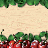 Many cherries and leaves on wooden background.