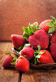 Fresh organic ripe strawberry with water splash