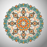 Ornamental round colorful geometric pattern in aztec style