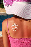 from sun cream on the female back 