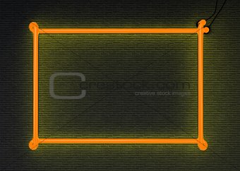 Neon frame isolated on black wall background