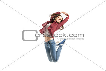 Young girl dancing over white background