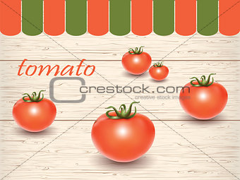 Red fresh tomatoes on the table.