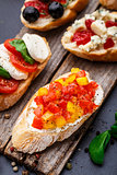 Bruschetta with chopped tomatoes, herbs and oil