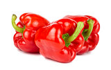 Three red ripe sweet peppers
