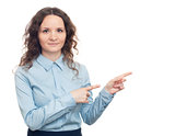 Smiling young business woman pointing her finger