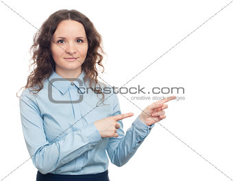 Smiling young business woman pointing her finger