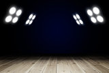 Light in dark room with wooden floor