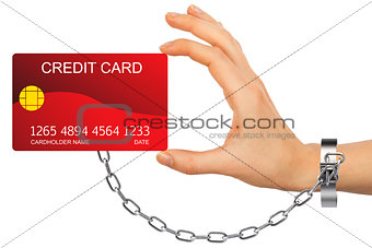 Closeup of red credit card holded by chained hand