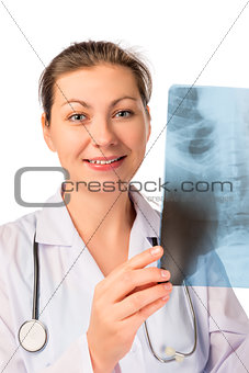 Smiling doctor radiologist with an X-ray in hands