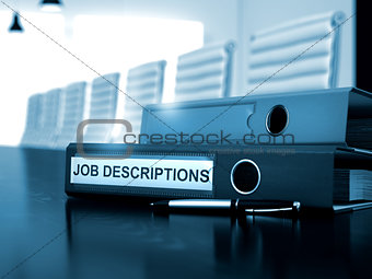 Job Descriptions on Ring Binder. Toned Image.