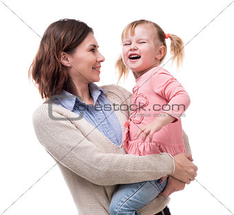 mother with little daughter in her arms hugging